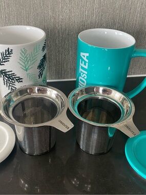 A set of DAVIDsTEA Stainless Steel Tea Infusers - Incl. Mugs, Lids, And Infusers